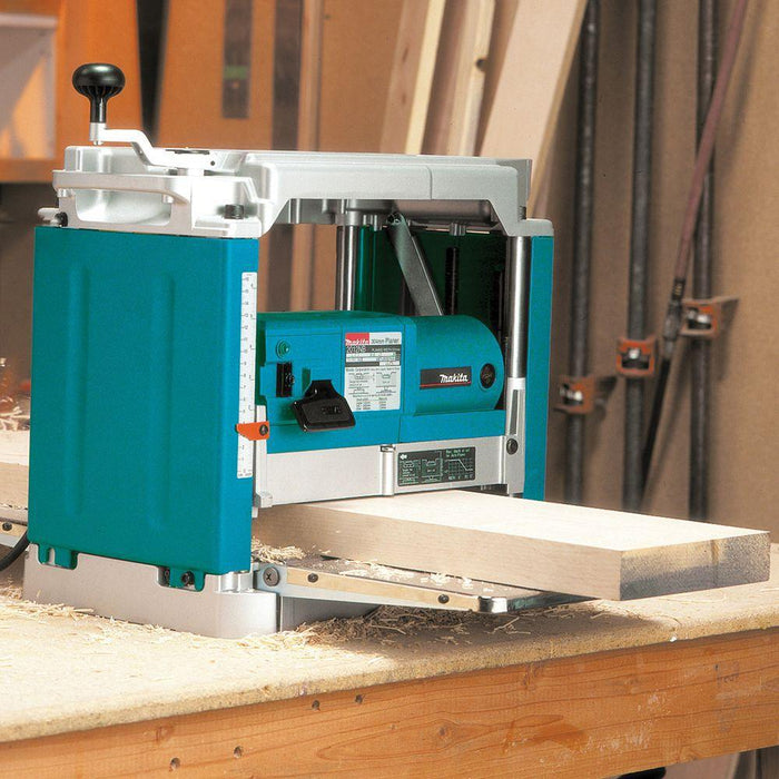 Makita 2012NB 12 In Planer with Interna-Lok Automated Head Clamp