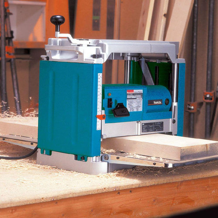Makita 2012NB 12 In Planer with Interna-Lok Automated Head Clamp